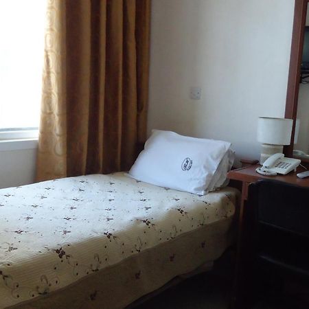 Rainbow Hotel Dar es Salaam Habitación foto